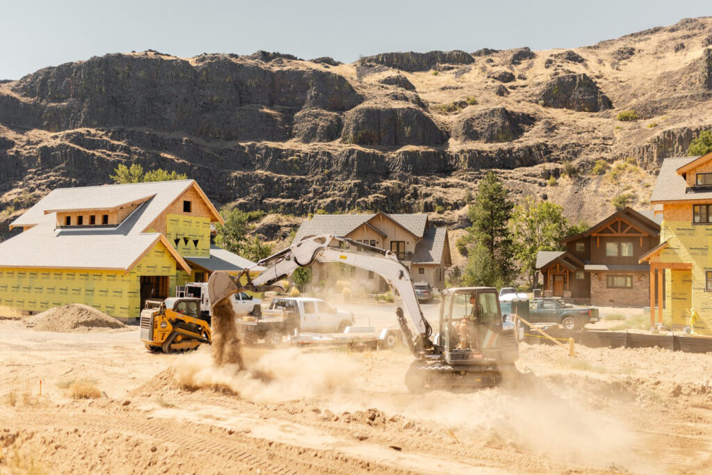 Wide-angle view of Jewett Dirt Works excavating a foundation, showcasing expert site preparation and grading for new construction in Kittitas County, Tri-Cities, Yakima, and Ellensburg.