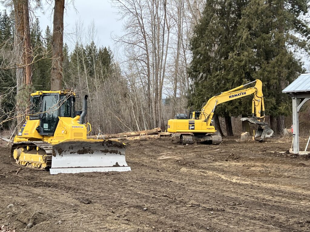 Jewett Dirt Works heavy equipment in action, excavating and grading land for a construction project in Kittitas County, Tri-Cities, Yakima, and Ellensburg.